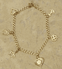 #30498 14K Gold Variety Symbols Bracelet